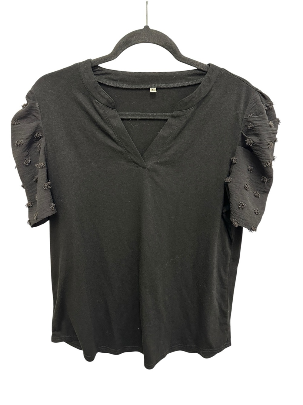 Black V-neck short sleeve top with textured pom pom detailed sleeves Size L